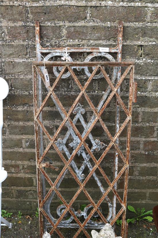 Two wrought iron window guards